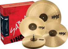 Load image into Gallery viewer, SABIAN 15005XTMN HHX Performance Set with 14” Medium Hats, 16” and 18” Thin Crashes, and 21” Thin Ride cymbals alongside red SABIAN box