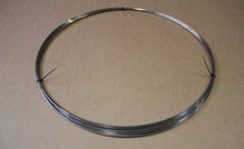 Load image into Gallery viewer, Coiled Fret Wire - 047x095 Nickel/Silver (per pound)
