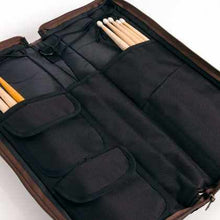Load image into Gallery viewer, SABIAN Arena stick bag black with brown accents holding drumsticks and mallets
